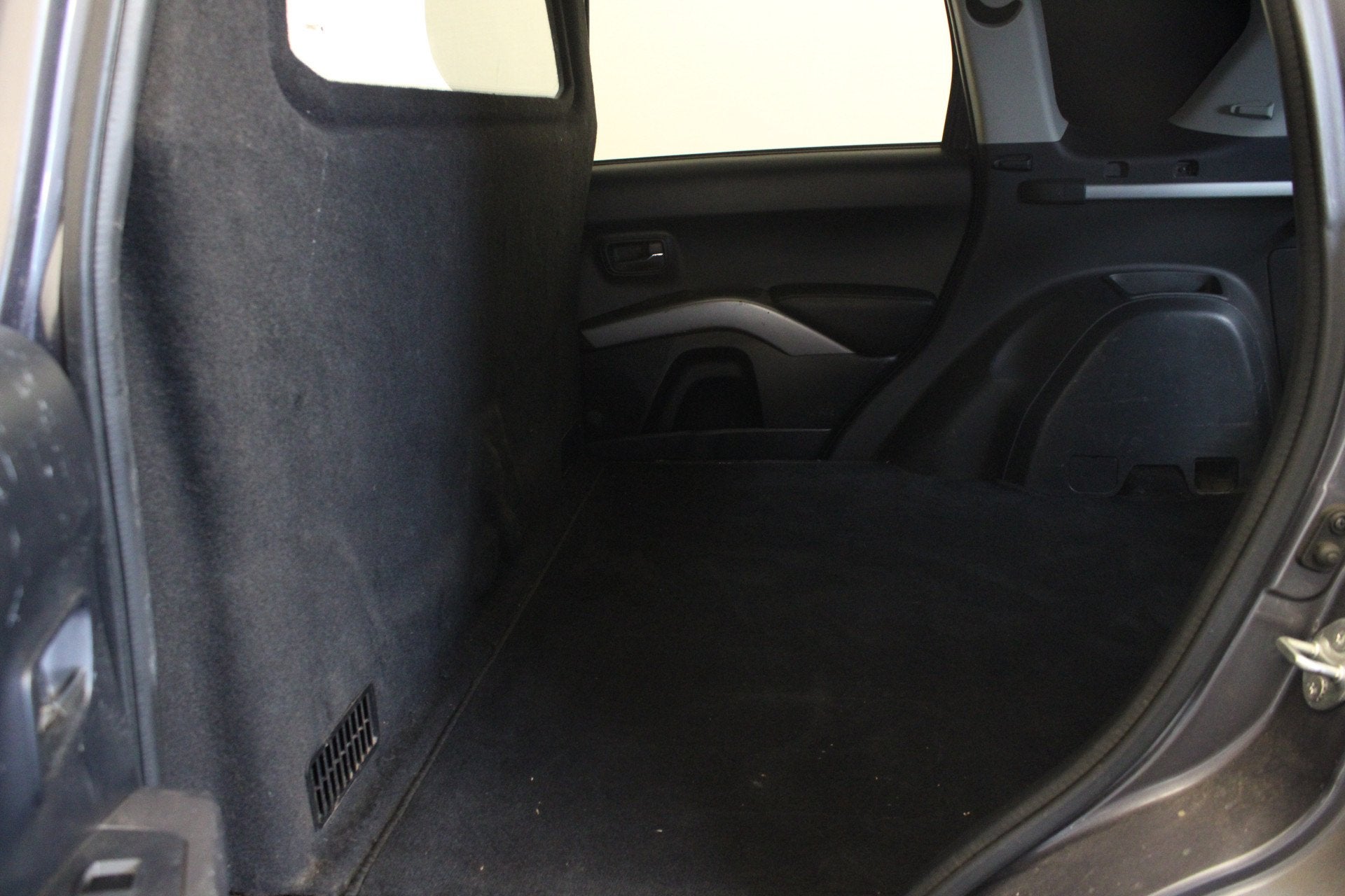 Mitsubishi Outlander 2.2 DI-D Intense + (bj 2009), Auto's, Bestelauto's, Gebruikt, Zwart, Vierwielaandrijving, 2 stoelen