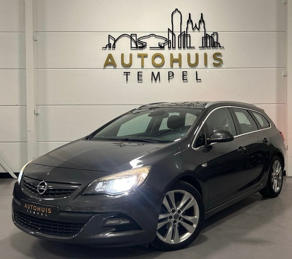Opel Astra Sports Tourer 1.4 Turbo Sport Nap Airco Cruise Pa, Auto's, Opel, Voorwielaandrijving, Euro 5, Stof, Gebruikt