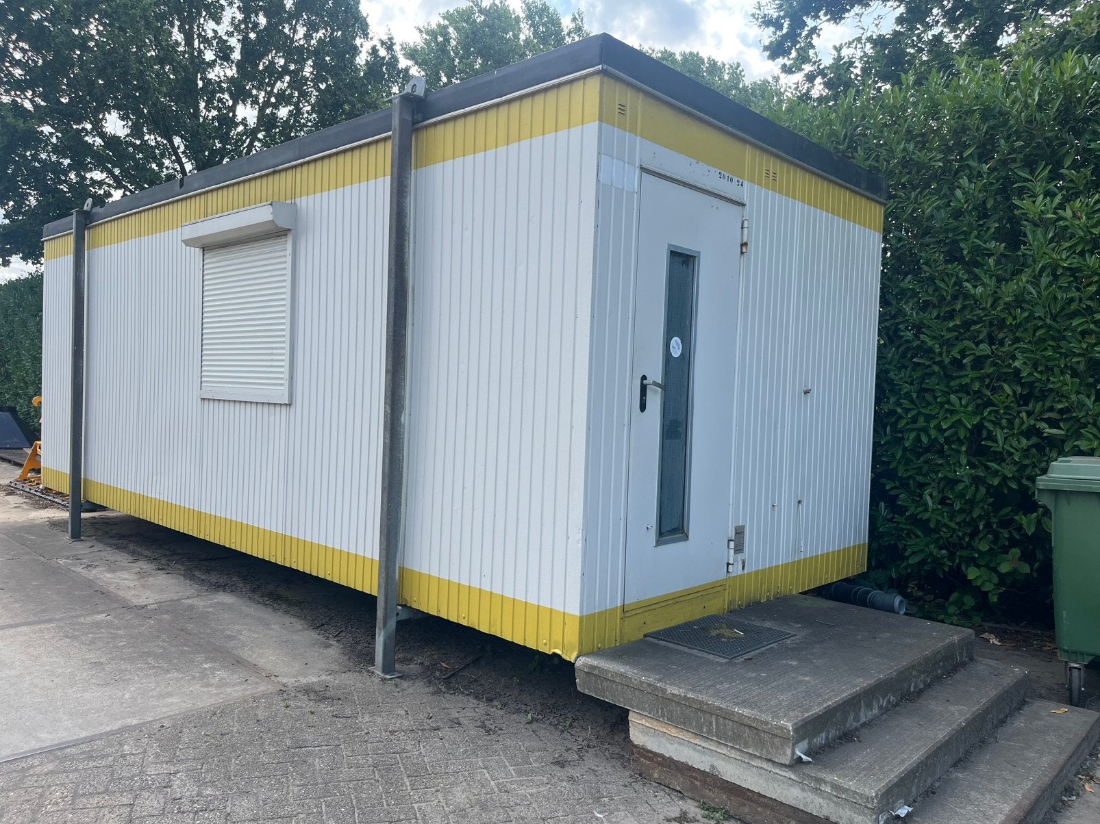 Kantoorunit bouwkeet unit, Ophalen