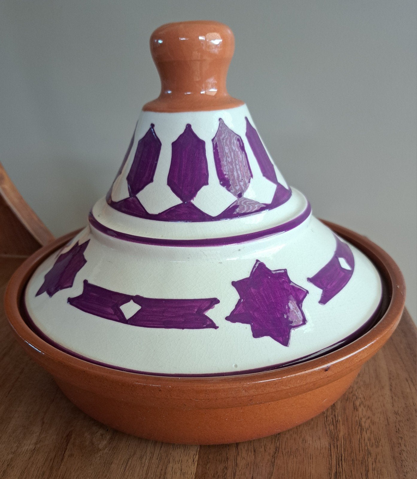 Aardewerk Tajine, Ophalen