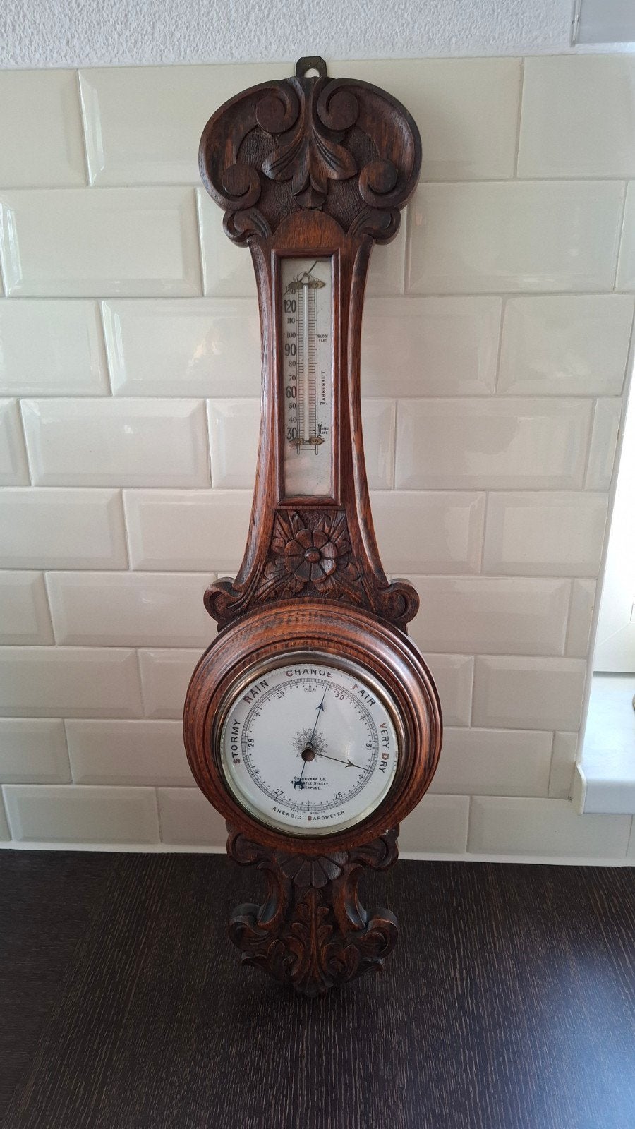vier antieke weerstation barometers, Ophalen