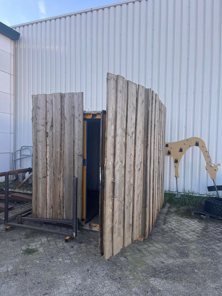 Container bekleed met hout., Ophalen