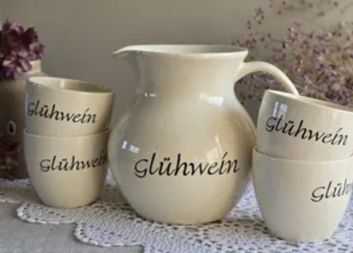 Glüweinset, kan met 4 mokken van Jet ter Steege, Ophalen of Verzenden, Zo goed als nieuw, Overige stijlen, Kop(pen) en/of Schotel(s)