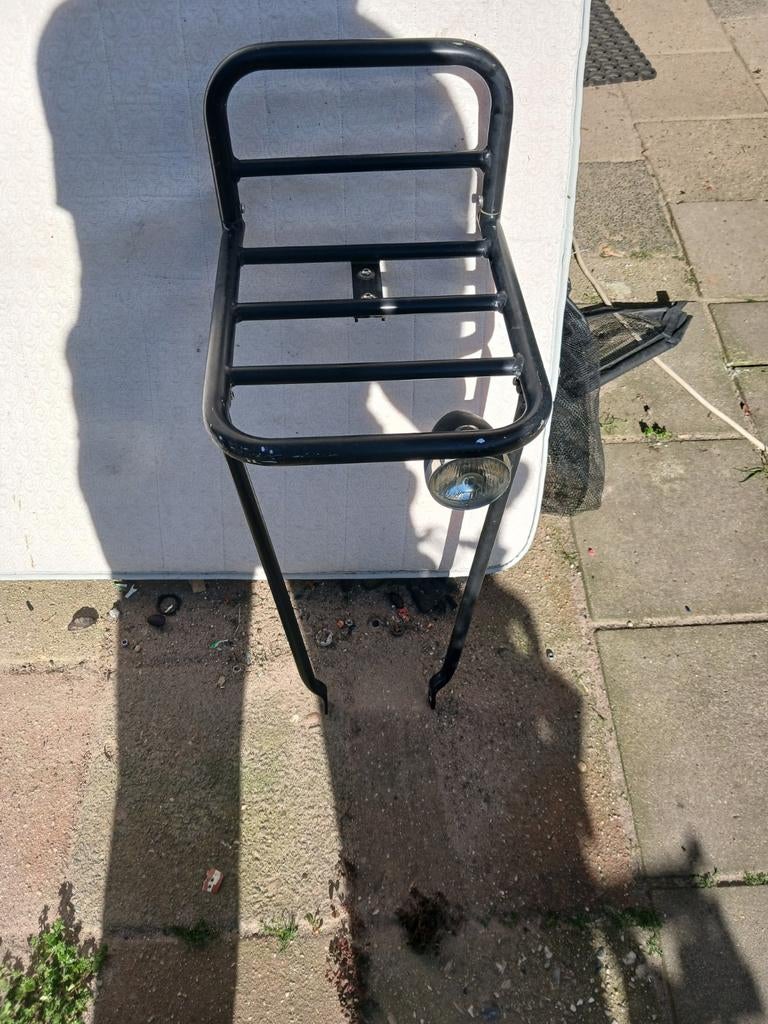 Voorste bagage drager, Ophalen, Gebruikt