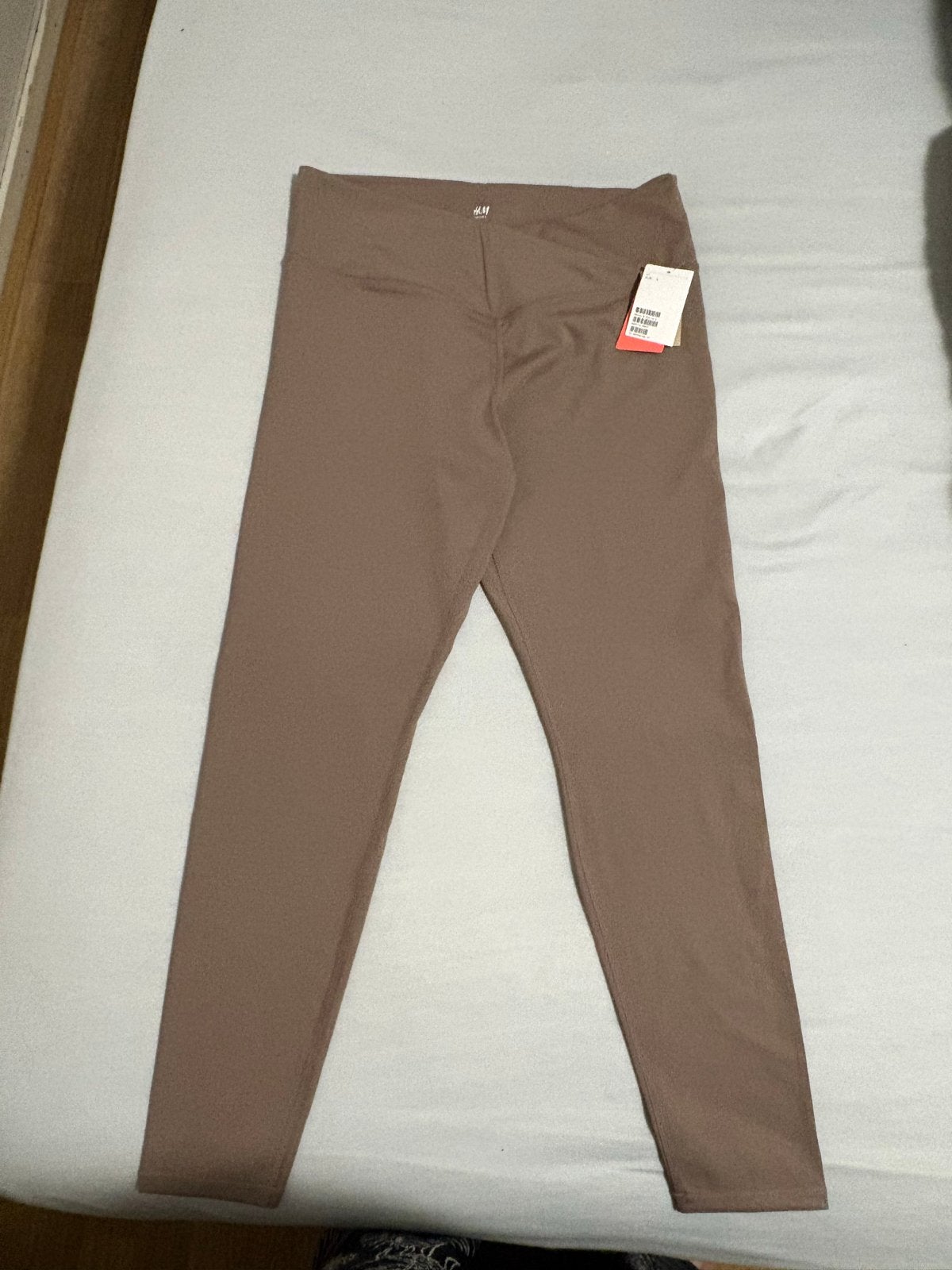 Nieuwe H&M sportlegging maat L, Kleding | Dames, Legging, Bruin, Nieuw, Ophalen of Verzenden
