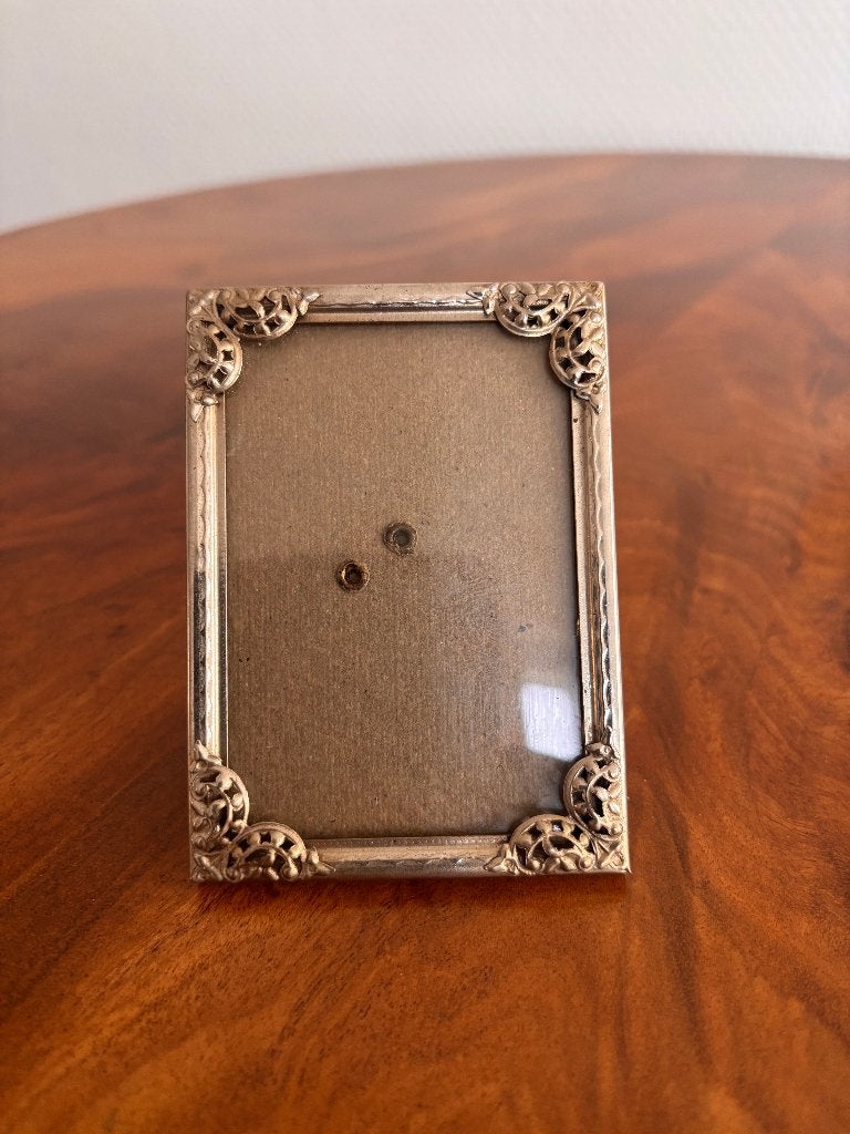 Vintage fotolijst metmetalen lijst en glas 7*10., Antiek en Kunst, Ophalen of Verzenden