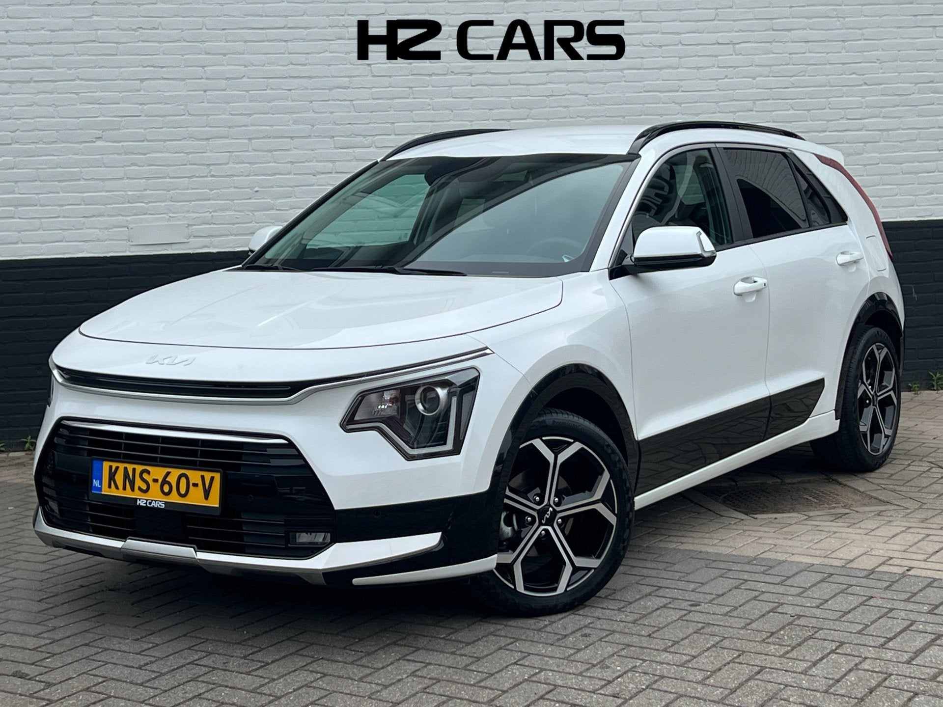 Kia Niro 1.6 GDi Hybrid DynamicLine|18 inch|Camera|Keyless|A, Auto's, Kia, Dealer onderhouden, Gebruikt, Zwart, Leder en Stof