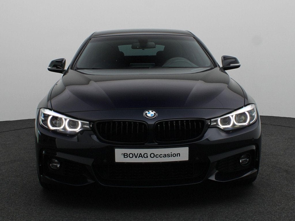 BMW 4 Serie Gran Coupé 440i High Executive | M Sportpakket, Auto's, Gebruikt, Euro 6, 1595 kg, Zwart
