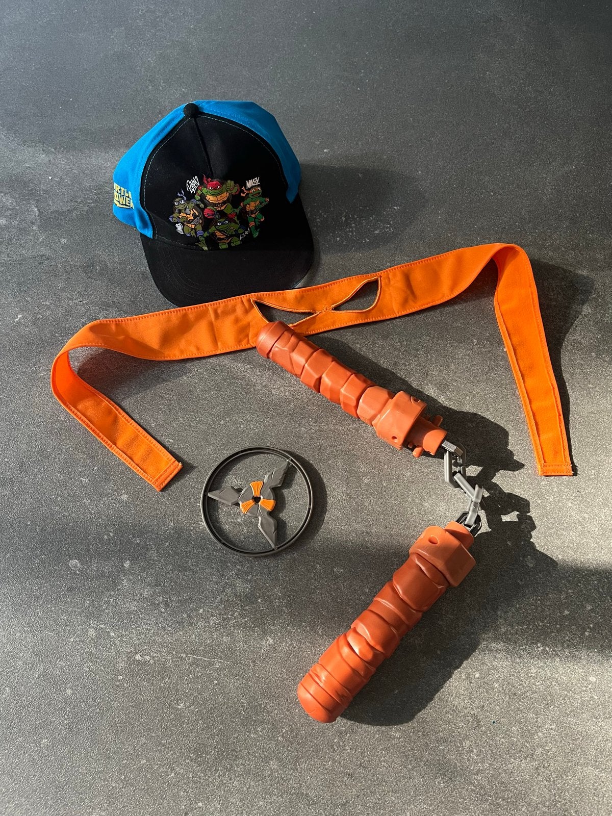 Teenage Mutant Ninja Turtles: pet, nunchucks, masker & ster, Ophalen of Verzenden, Gebruikt