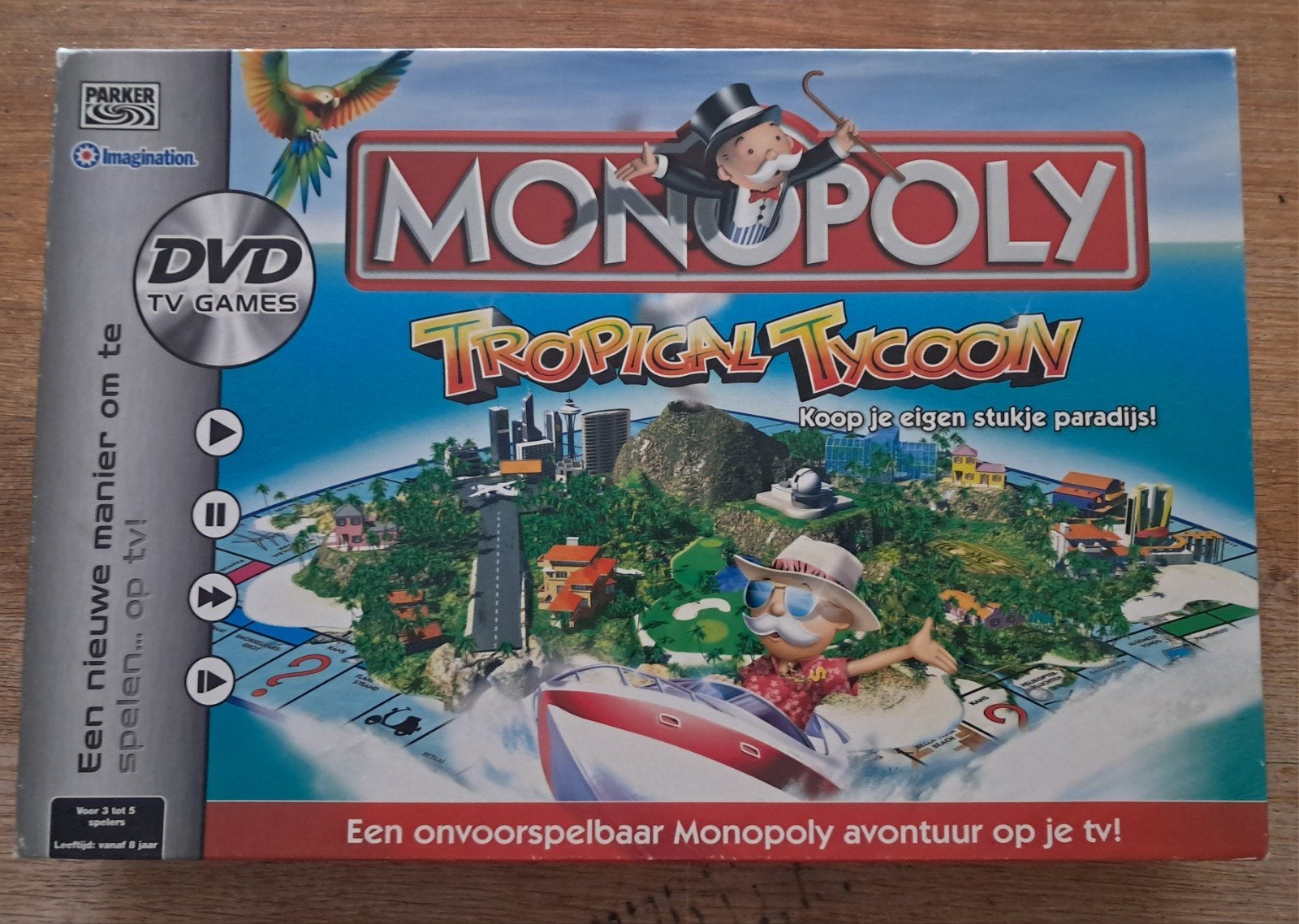 Monopoly Tropical Tycoon - Bordspel met DVD TV Games, Hobby en Vrije tijd, Drie of vier spelers, Ophalen of Verzenden, Gebruikt