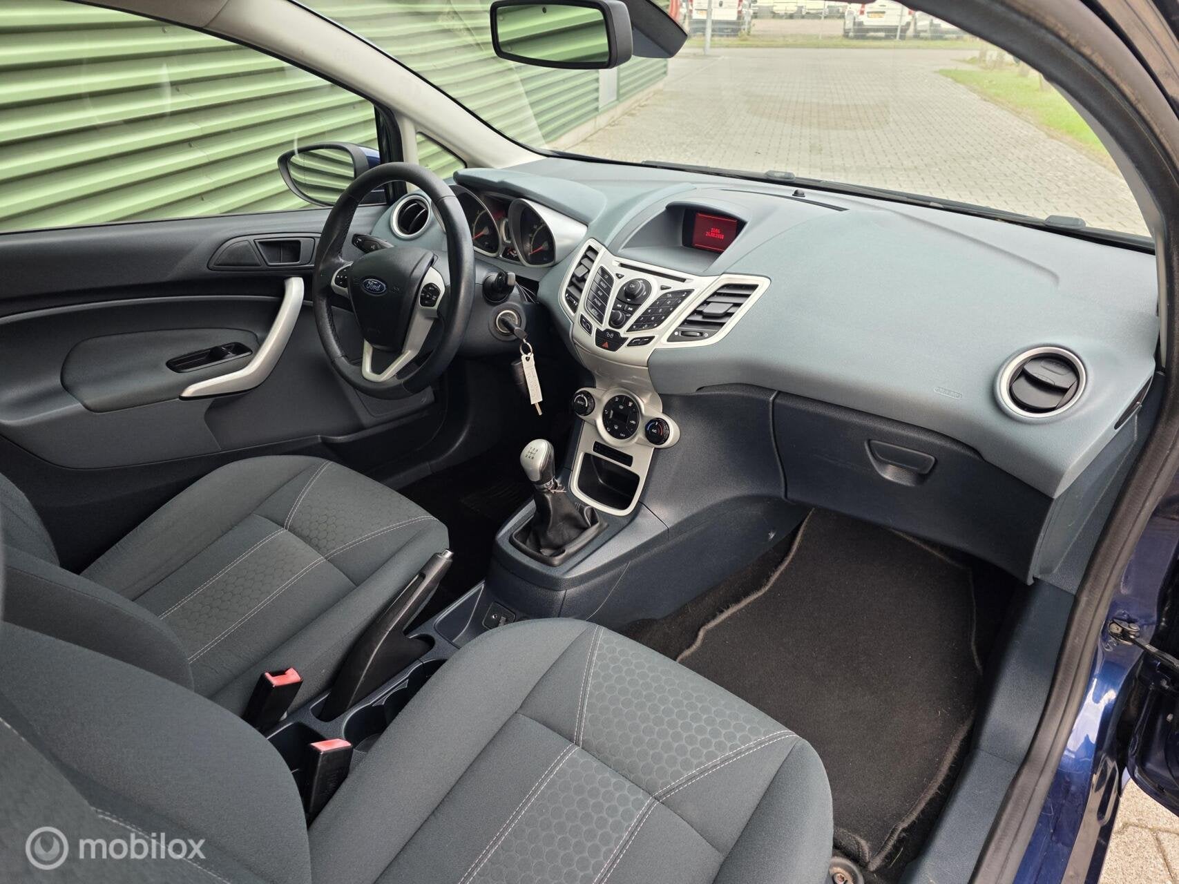 Foto 16 van Ford Fiesta 1.25 Titanium|Airco|2x Sleutel|PDC|