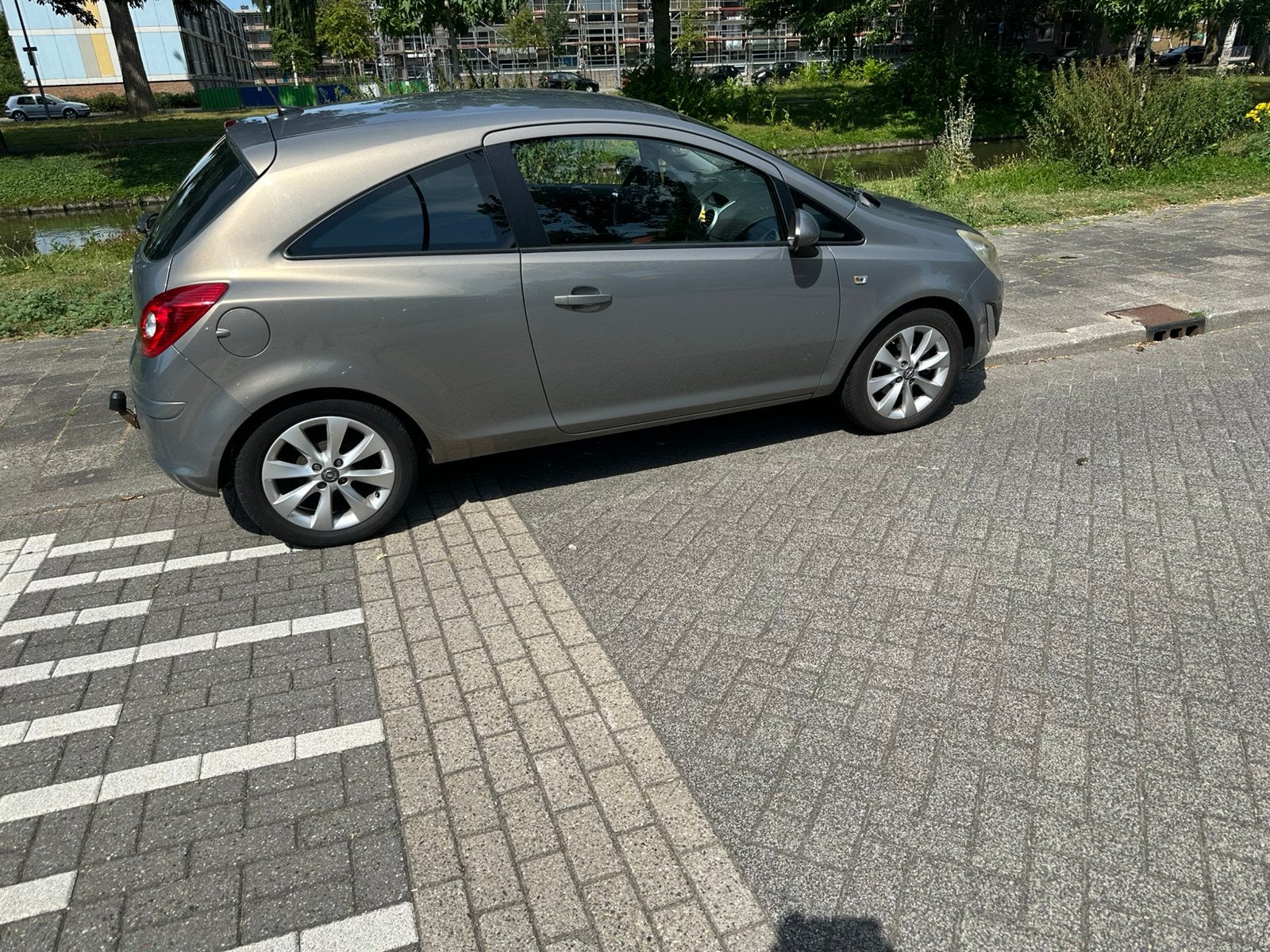 Opel Corsa 1.2 16V LPG 3D 2012 Bruin, Auto's, Opel, Particulier, Corsa, Airbags, Airconditioning, Boordcomputer, Centrale vergrendeling
