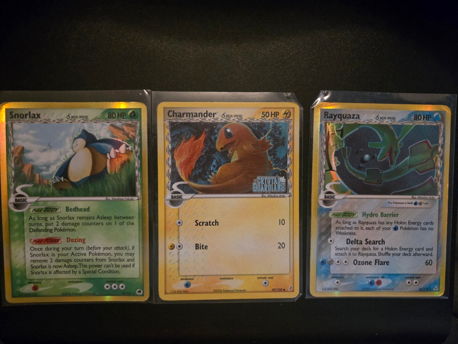 Rayquaza, charmante en snorlax delta species, Hobby en Vrije tijd, Verzamelkaartspellen | Pokémon, Ophalen of Verzenden, Zo goed als nieuw