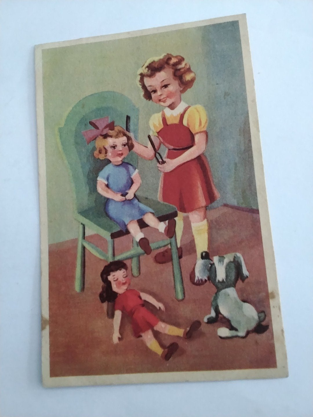 BIJ DE KAPSTER.   MET POP EN HOND. 1941, Ophalen of Verzenden, 1940 tot 1960, Overige thema's
