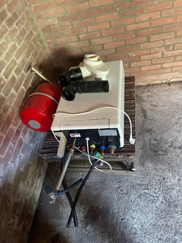 Intergas Kombi Kompakt HRE 28/24 cv-ketel (2022)+expansievat, Ophalen, 30 tot 80 cm, Gebruikt, Hoog rendement (Hr)