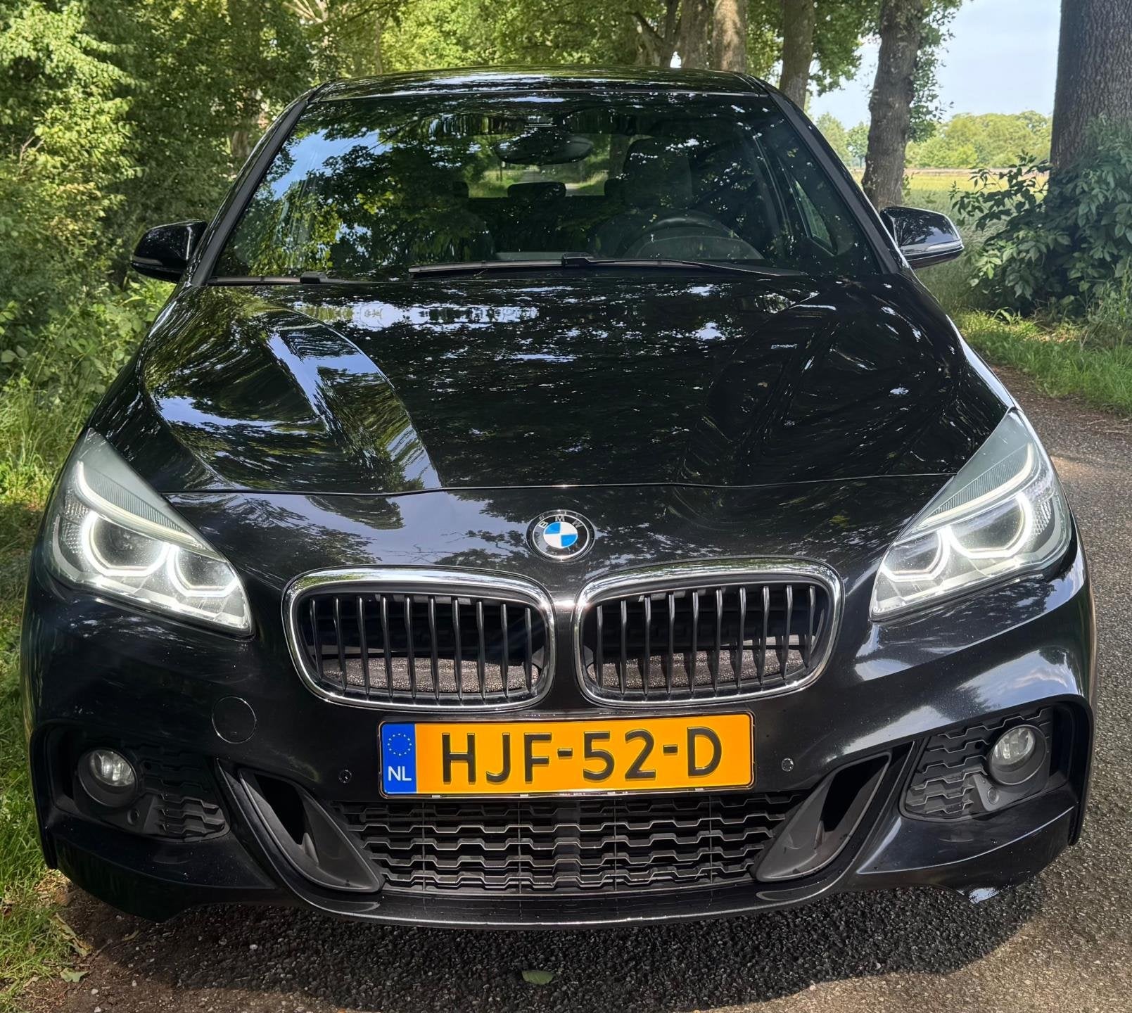 BMW 2-serie Active Tourer 220i High Executive M Performance, Auto's, 730 kg, Gebruikt, Alcantara, Zwart