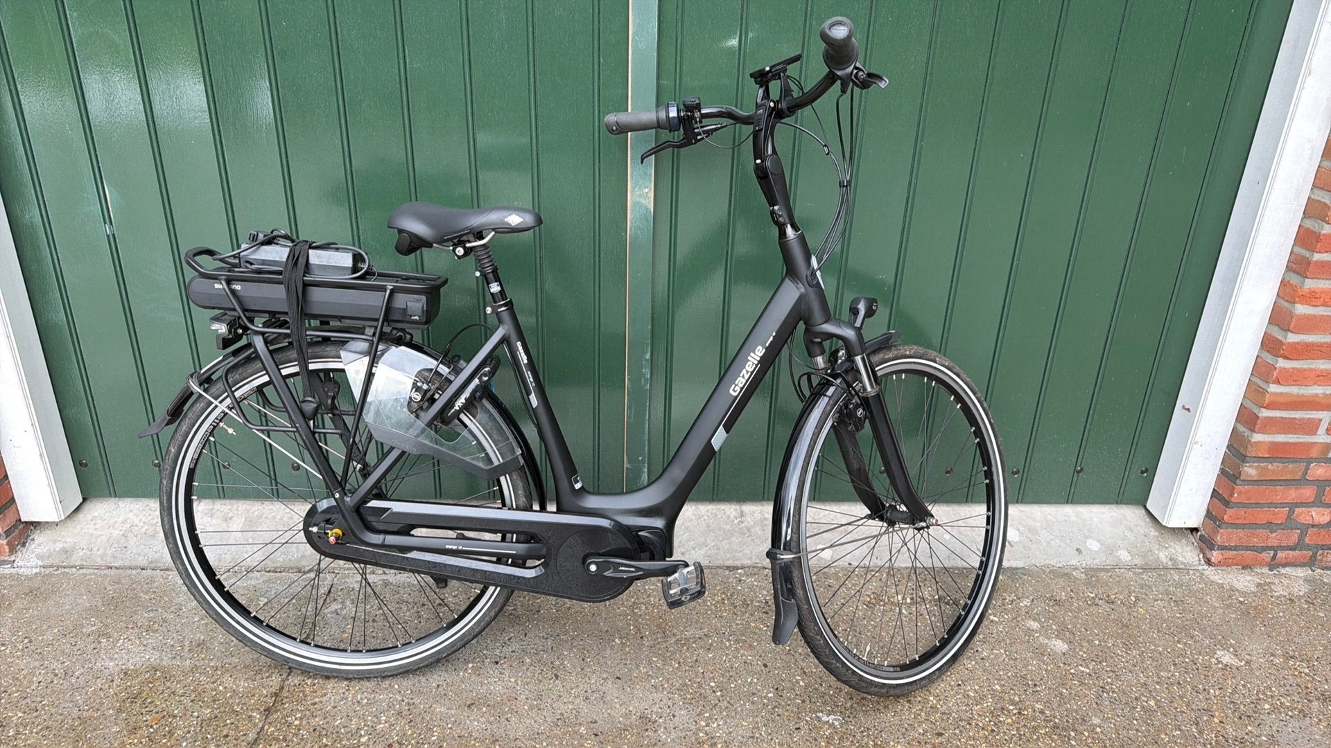Gazelle orange c 7 midden motor, Fietsen en Brommers, Ophalen of Verzenden, Zo goed als nieuw