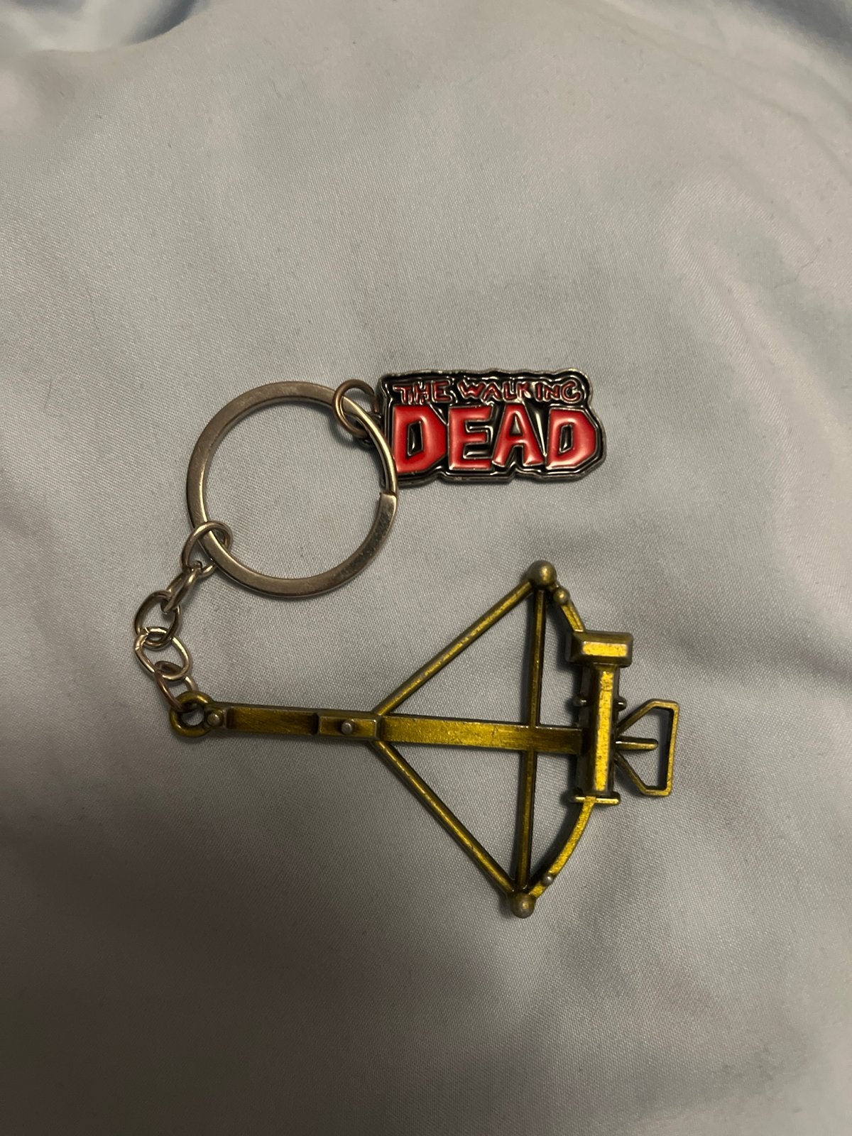 The Walking Dead Kruisboog Sleutelhanger, Ophalen of Verzenden, Gebruikt, Merk