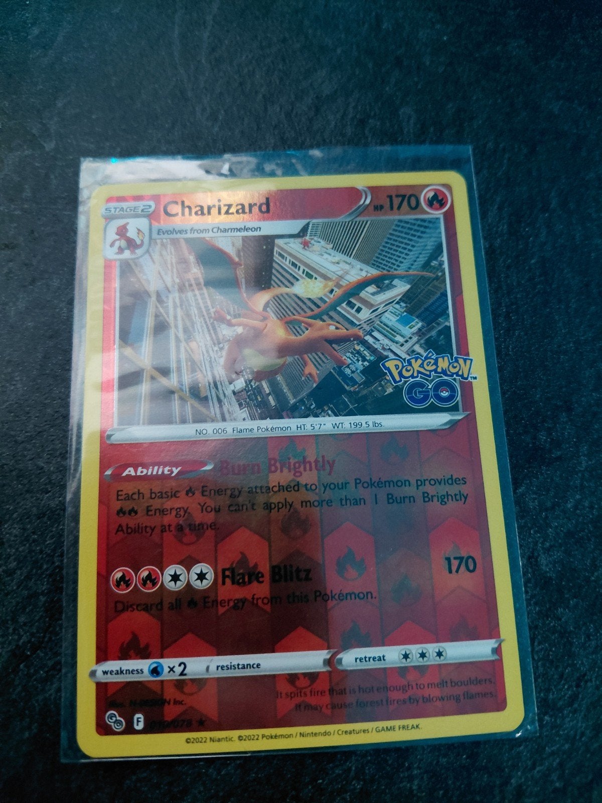 Charizard holo - kaart 010/078 uit 2022 (topconditie), Ophalen of Verzenden, Nieuw, Losse kaart, Foil