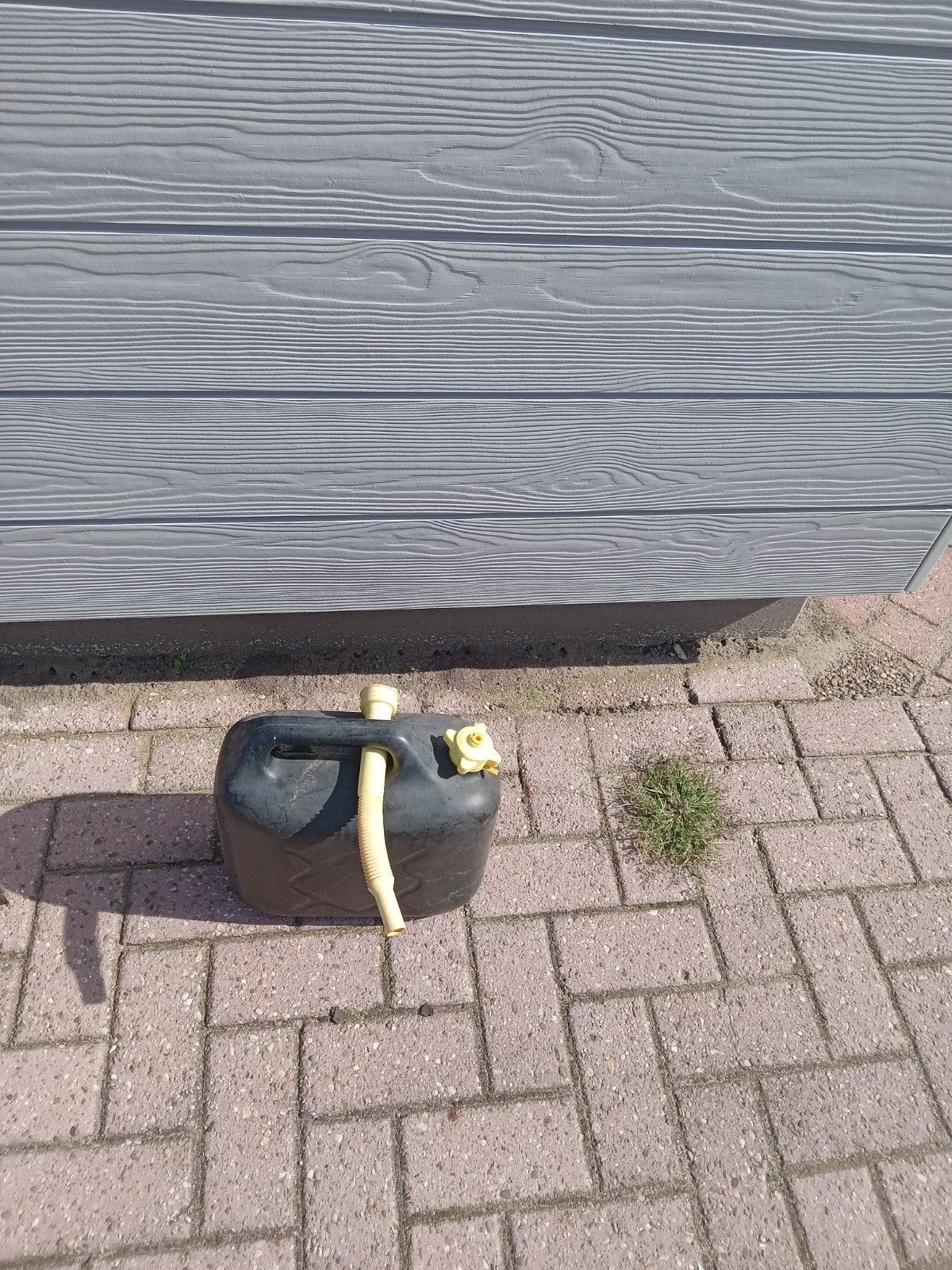 Gratis ophalen benzine kan voor grasmaaier, Ophalen, Gebruikt