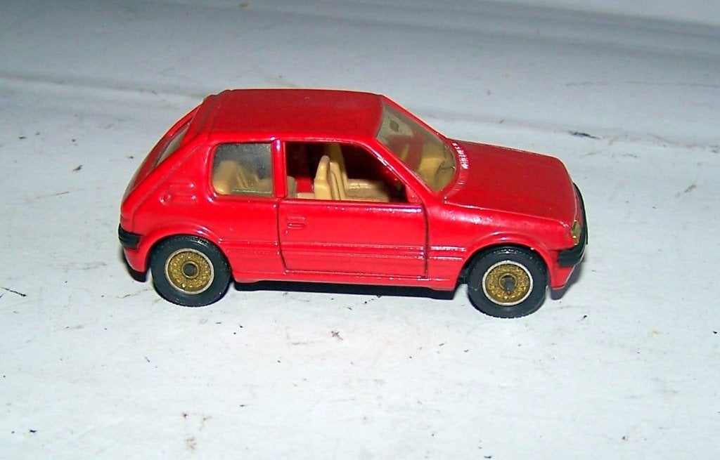 Solido Peugeot 205 GTI. 1/43. Igs., Ophalen of Verzenden, Zo goed als nieuw, Auto, Solido