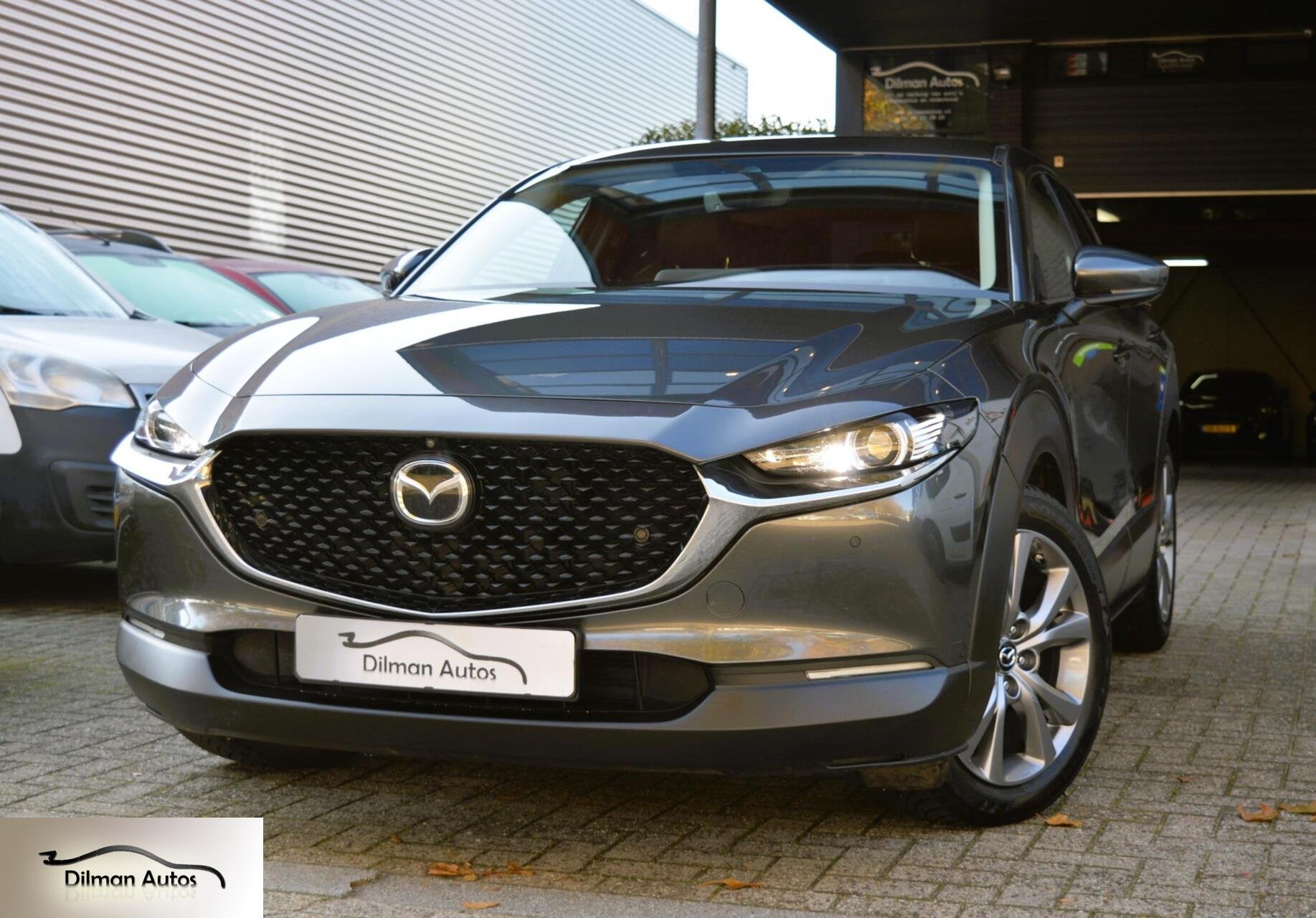 Mazda CX-30 2.0 e-SkyActiv M Hybrid Bose|Camera|Leder|Head!, 1998 cc, Zwart, 4 cilinders, Met garantie (alle)