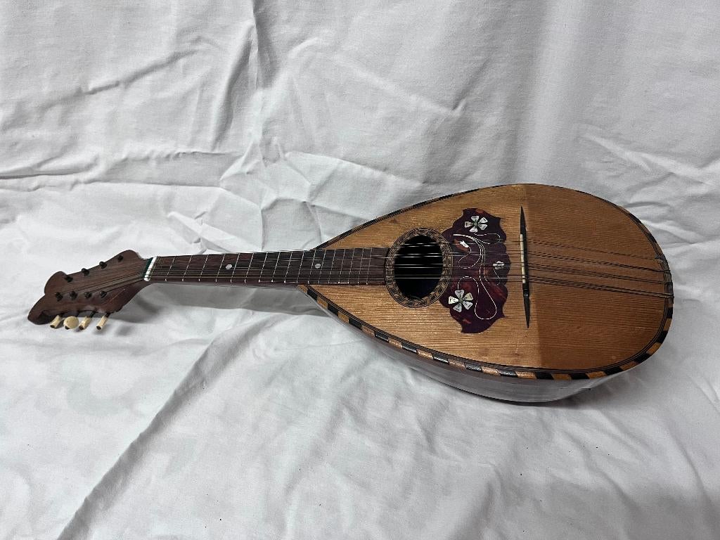 Antieke mandoline, Ophalen, Gebruikt