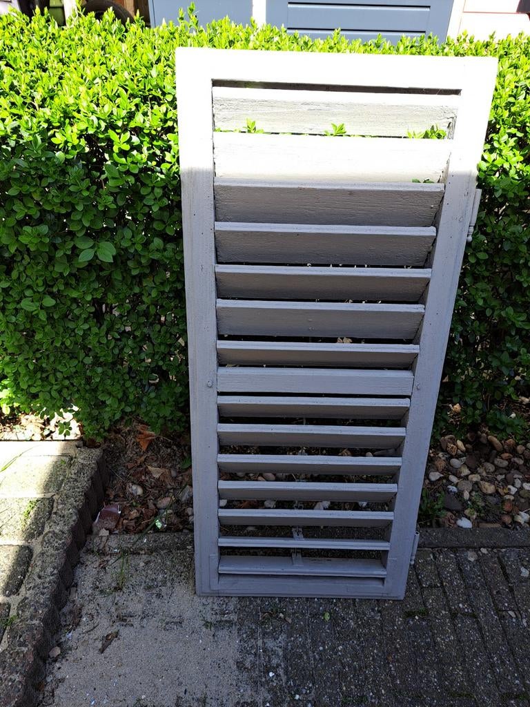 Houten luik met lamellen, Ophalen