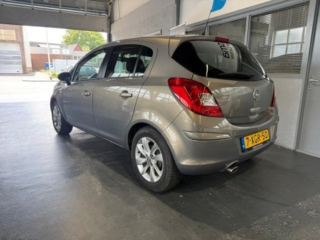 Opel Corsa 1.2-16V Design Edition Navi|Cruise|Clima, Auto's, Voorwielaandrijving, Euro 5, Gebruikt, 4 cilinders