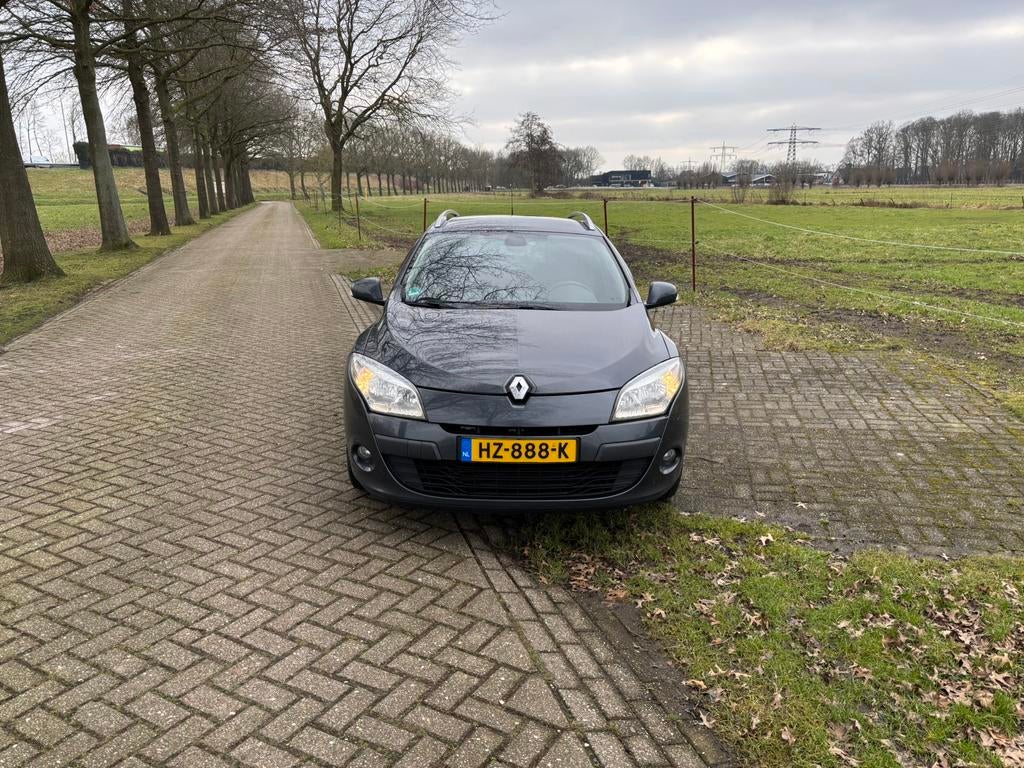 Renault Mégane 1.5 DCI 81KW Estate 2011 Grijs, Auto's, Voorwielaandrijving, Stof, Zwart, 4 cilinders