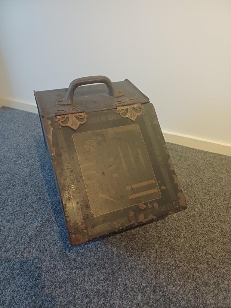 Oude kolenkit voor houtkachel, Ophalen
