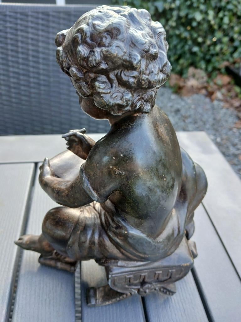 Bronzen lezende  putto gesigneerd, Antiek en Kunst, Kunst | Beelden en Houtsnijwerken, Ophalen of Verzenden