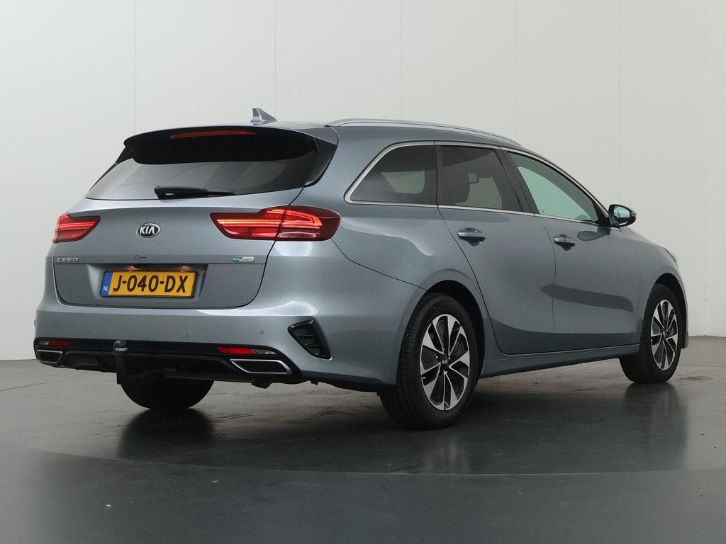 Kia Ceed Sportswagon 1.6 GDI PHEV DynamicPlusLine | Trekhaak, Auto's, Gebruikt, Leder en Stof, 1508 kg, Zilver of Grijs