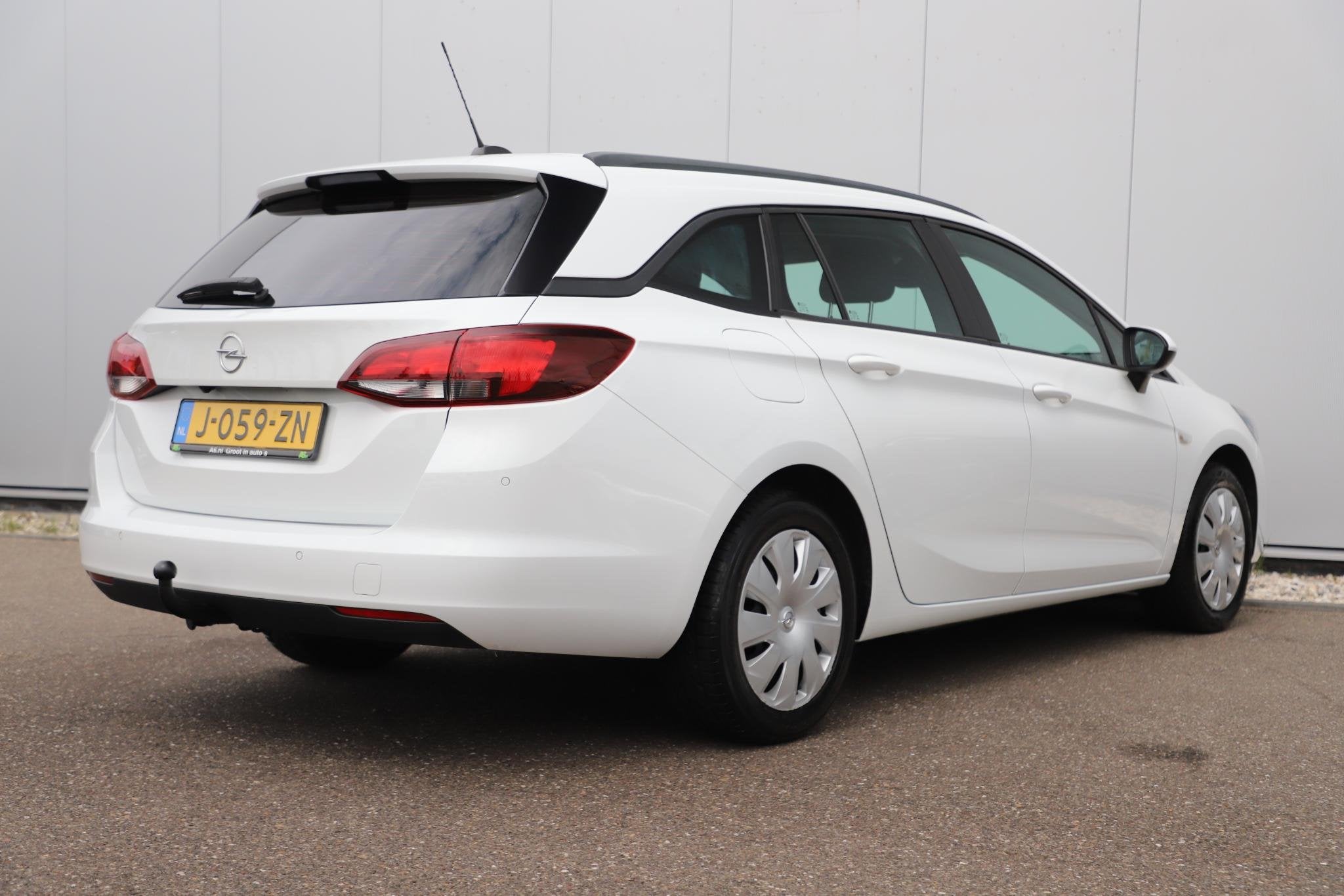 Opel Astra Sports Tourer 1.2 Business Executive 110PK Trekha, Auto's, Voorwielaandrijving, Stof, Gebruikt, 1199 cc
