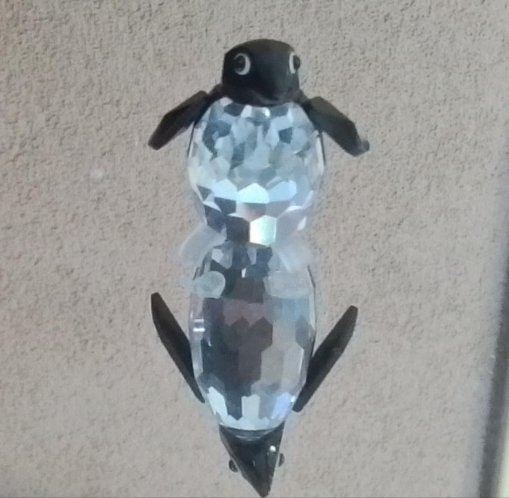 Swarovski pinguïn met zwarte kop en vleugels., Ophalen of Verzenden, Zo goed als nieuw, Figuurtje