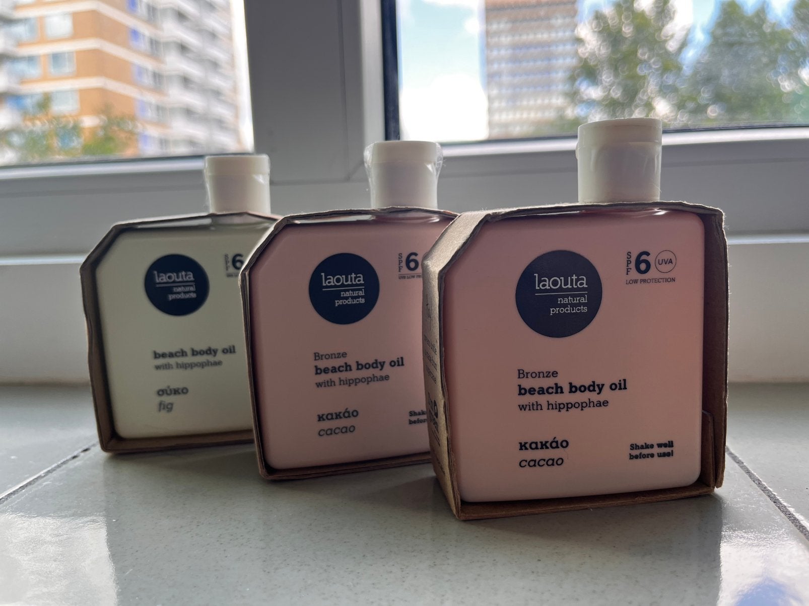 Laouta - drie flesjes beach body oil (nieuw), Sieraden, Tassen en Uiterlijk, Uiterlijk | Lichaamsverzorging, Ophalen of Verzenden