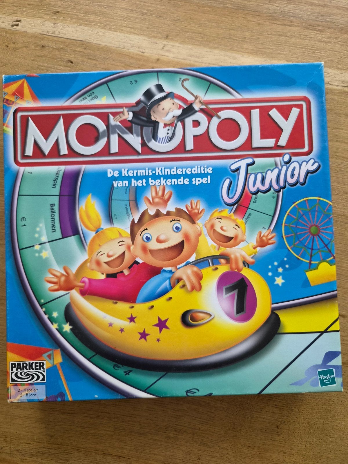 Monopoly Junior - De Kermis-Kindereditie, Hobby en Vrije tijd, Gezelschapsspellen | Bordspellen, Drie of vier spelers, Ophalen of Verzenden