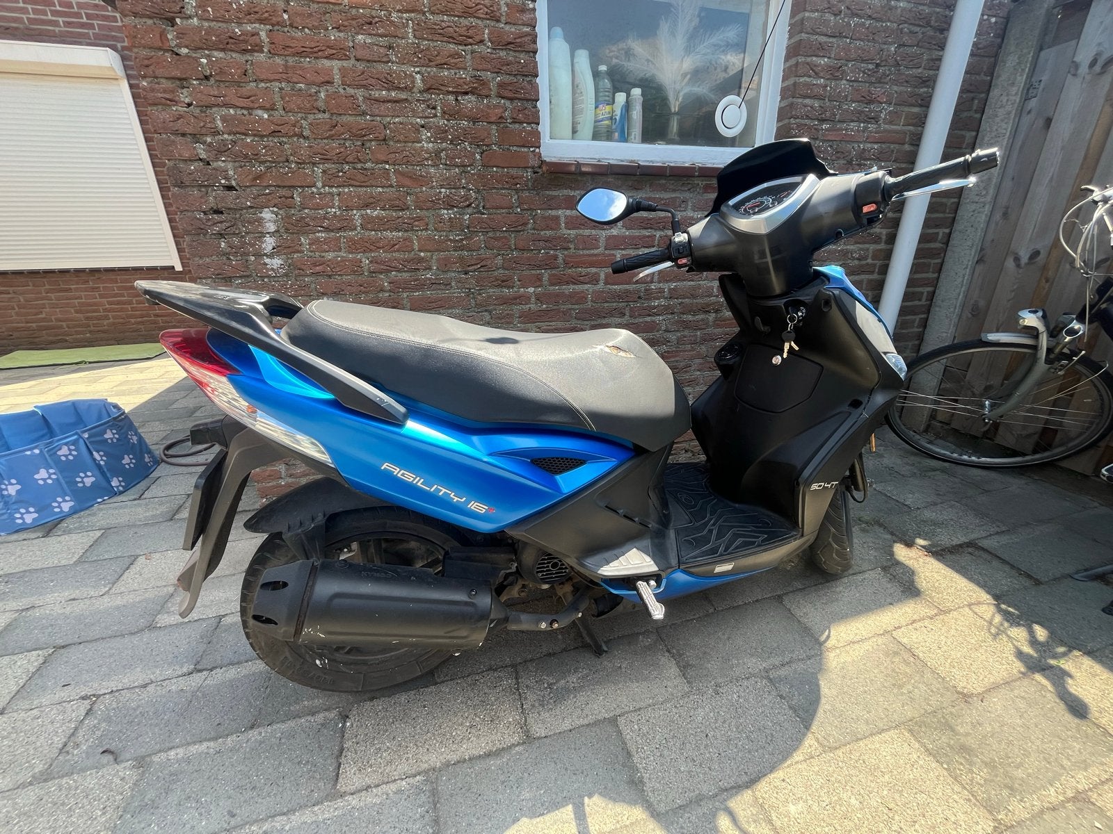Kymco Agility 16+ - Blauw - Kleine krasjes op de kappen, Fietsen en Brommers, Snorfietsen en Snorscooters, Ophalen of Verzenden
