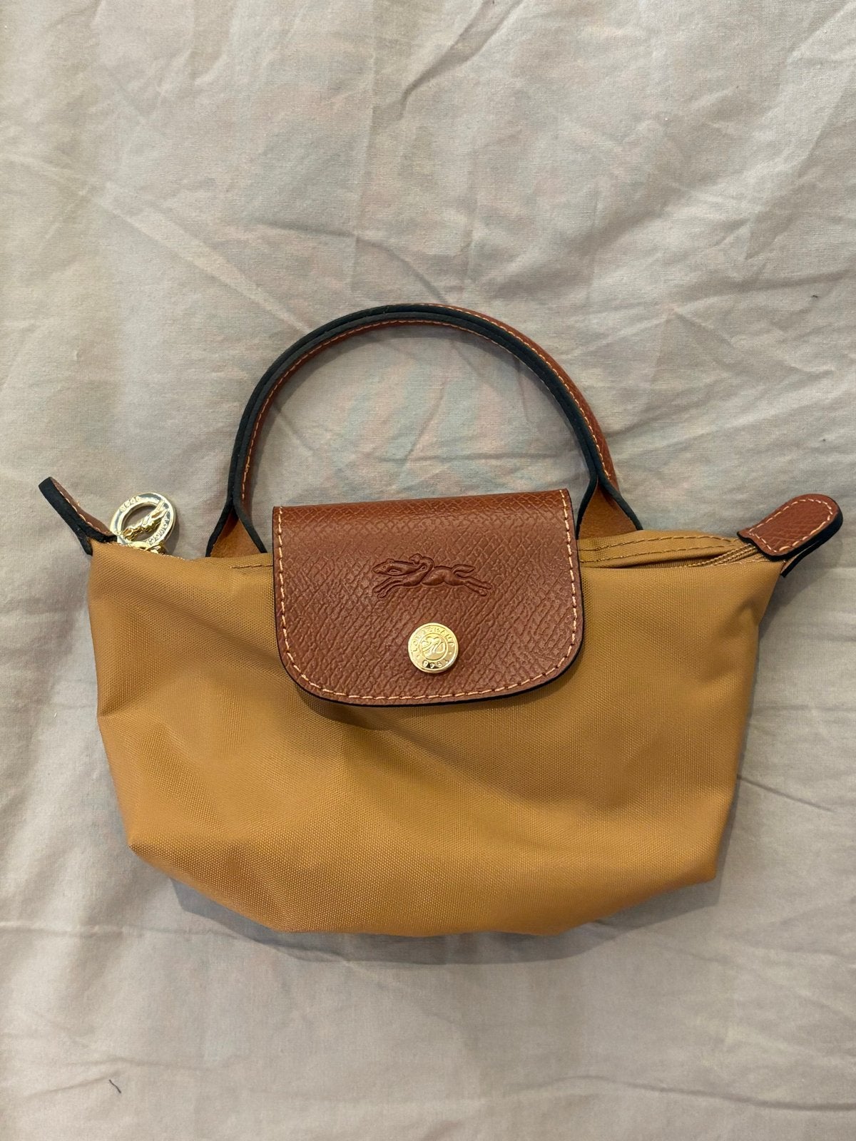 Nieuwe Longchamp Le Pliage Mini Handtasje met riem Beige, Ophalen of Verzenden, Nieuw, Beige, Avondtasje