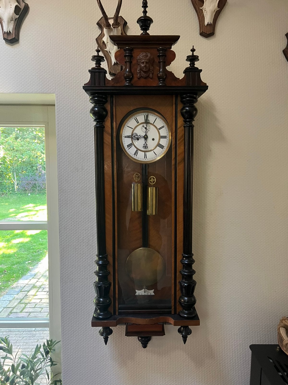 Antieke weense snaar regulateur, Ophalen