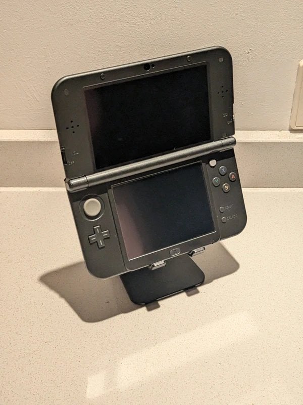 New Nintendo 3DS XL Zwart– getest & werkend, Spelcomputers en Games, Ophalen of Verzenden, Zo goed als nieuw, Zwart, 3DS XL