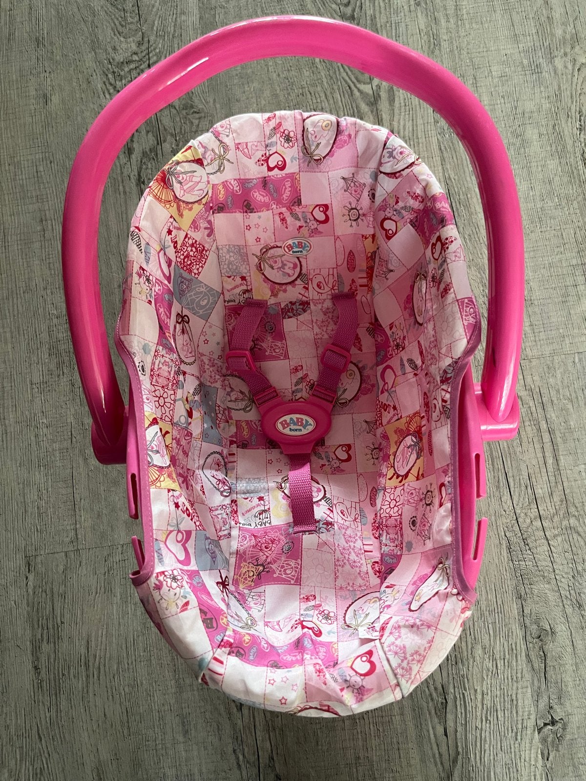 Baby Born poppen maxi-cosi - roze met patroon, Ophalen of Verzenden, Gebruikt, Babypop