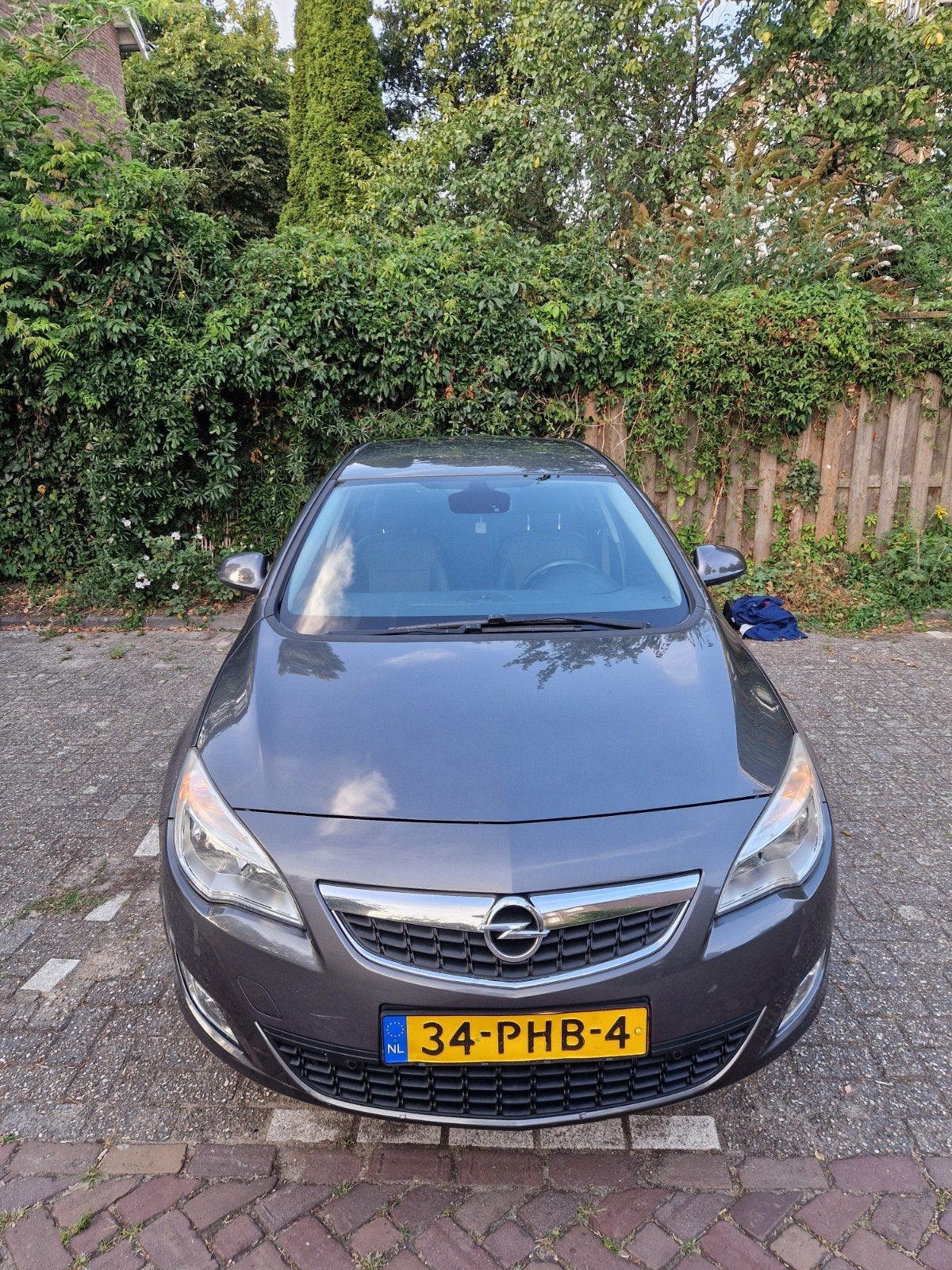 Opel Astra 1.4 Turbo Ecotec 103KW 5-D 2011 Grijs, Auto's, Voorwielaandrijving, Euro 5, 4 cilinders, Leder en Stof