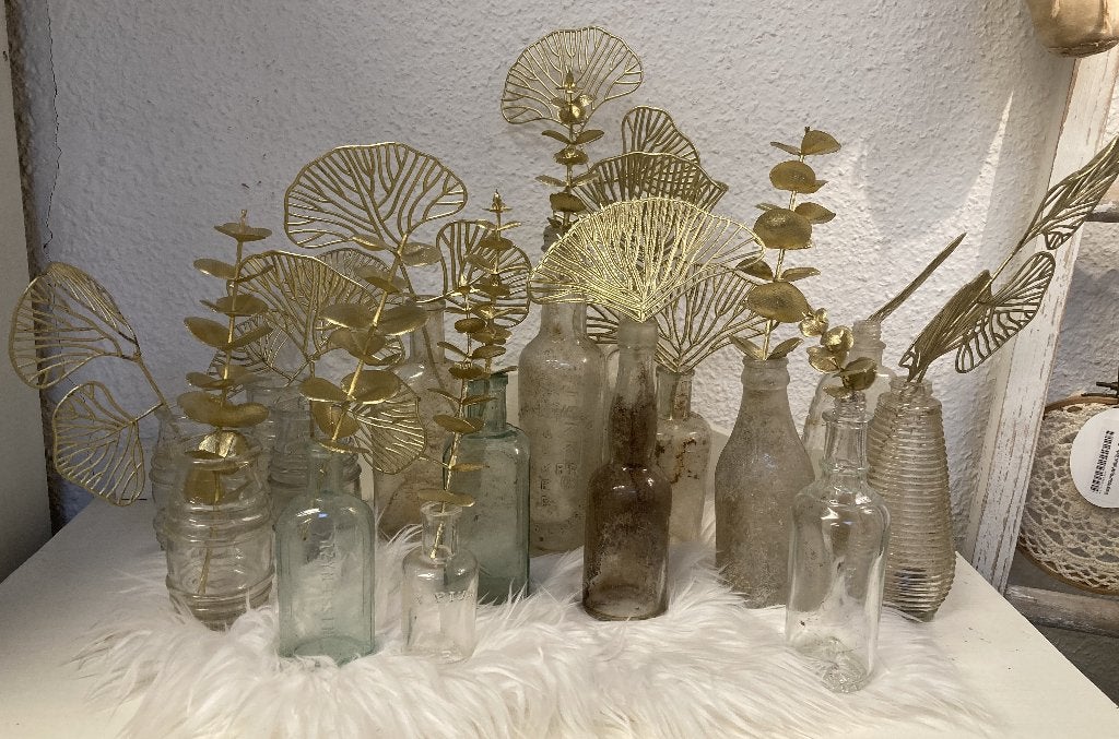 Brocante glazen flesjes / bodemvondsten, Ophalen