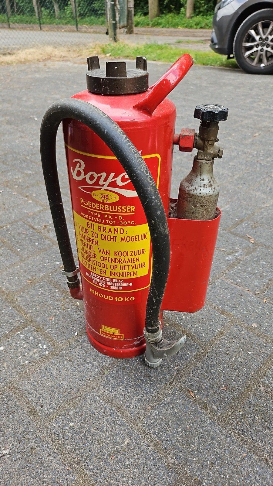 Oude brandblusser voor verzamelaar Boyce, Ophalen