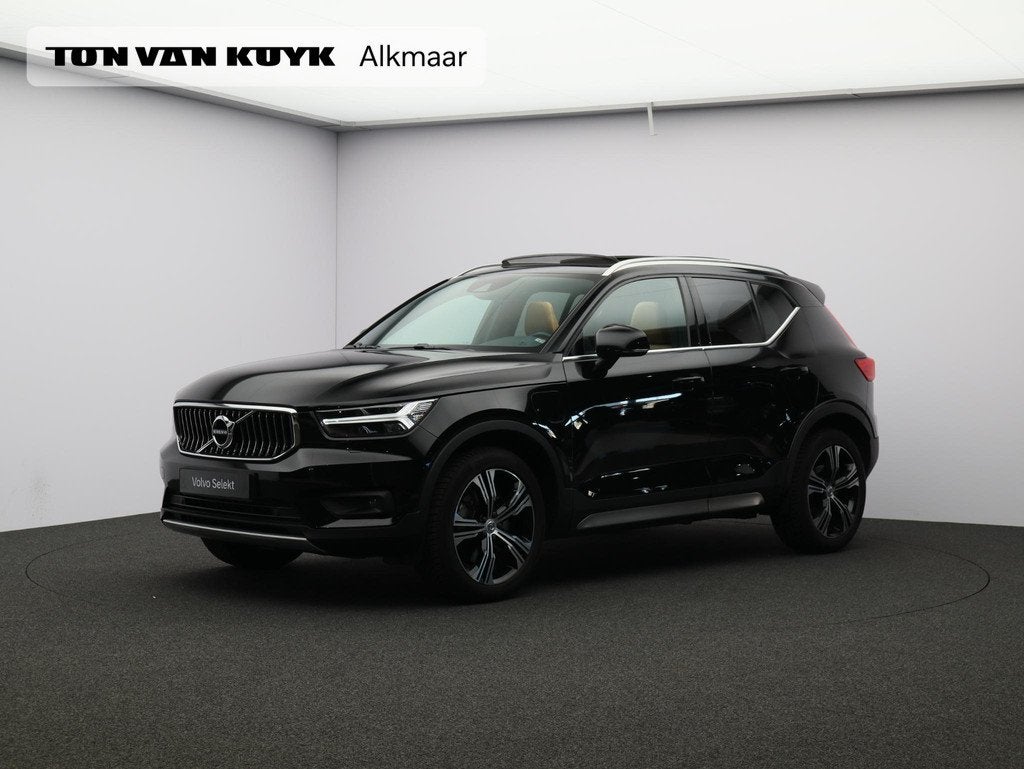Volvo XC40 T4 Recharge Inscription / Trekhaak / Pan. dak / S, 1712 kg, Met garantie (alle), Zwart, Hybride Elektrisch/Benzine