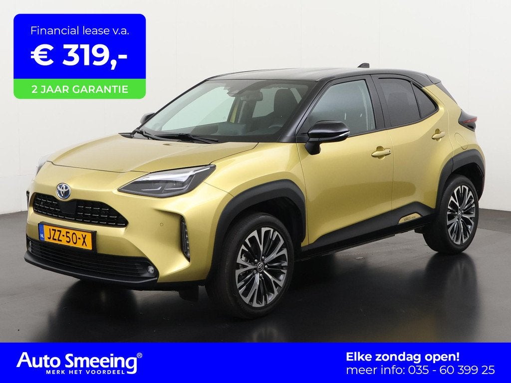 Toyota Yaris Cross 1.5 Hybrid Executive Bi Tone | Head-up |, Auto's, 12 maanden, Gebruikt, Overige kleuren, 1490 cc