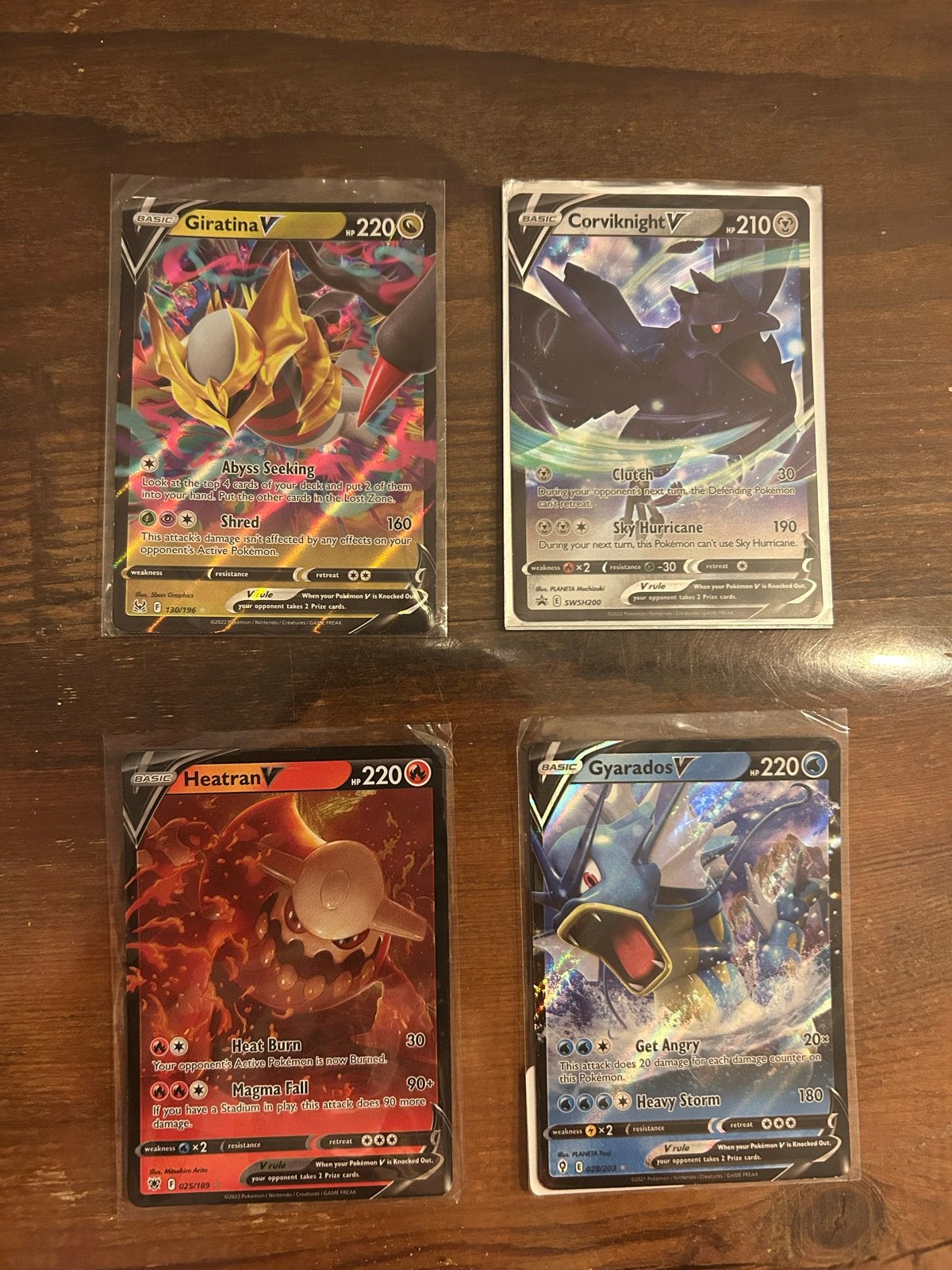Pokémon V kaarten: Giratina, Corviknight, Heatran, Gyarados, Ophalen of Verzenden, Zo goed als nieuw, Meerdere kaarten