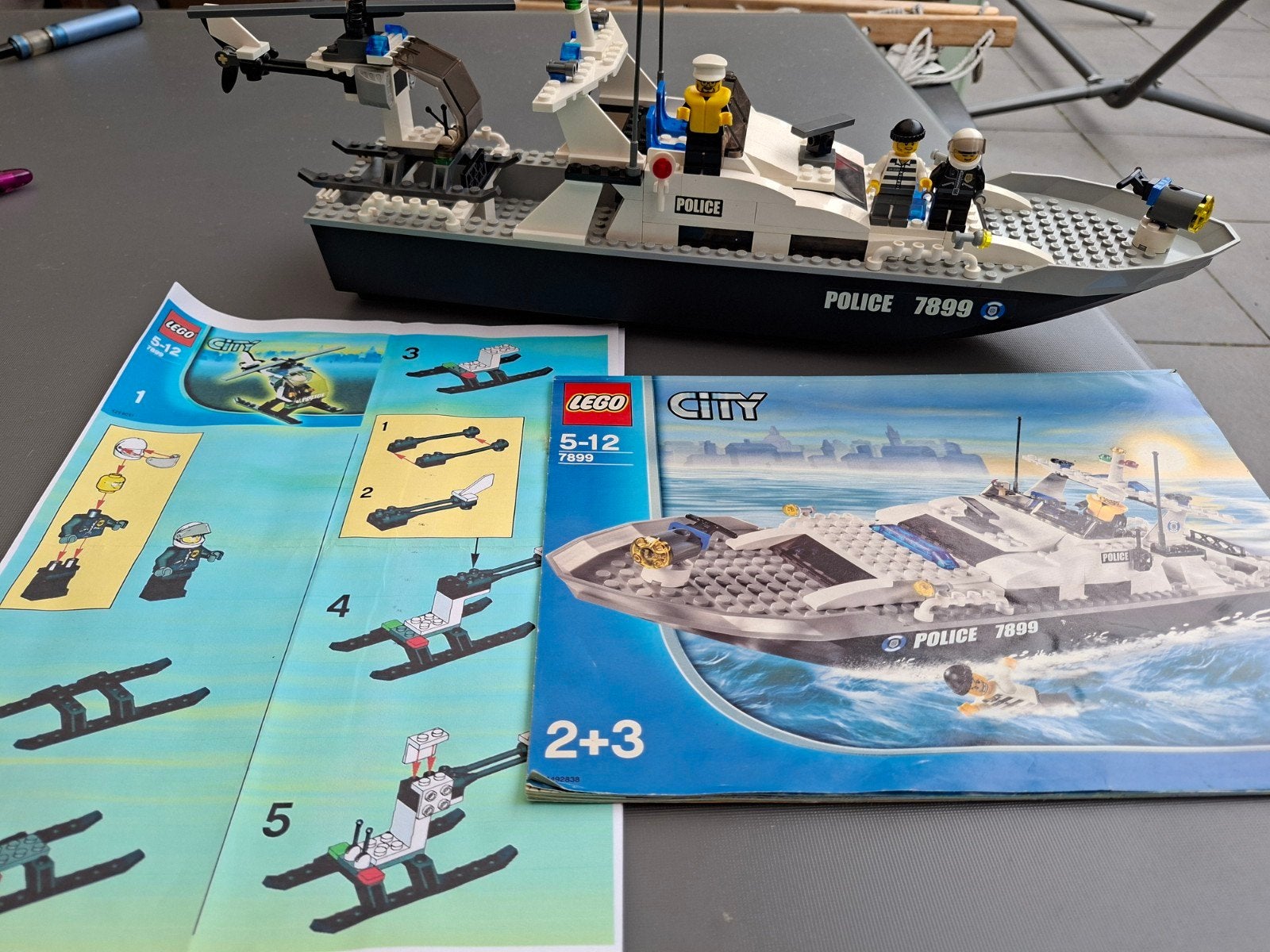 Lego City Politieboot 7899 met helikopter en minifiguren, Compleet, Lego, Ophalen of Verzenden, Complete set