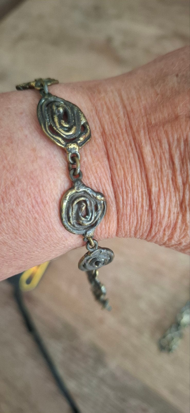 Handgemaakte armband met spiraalmotief, Ophalen of Verzenden